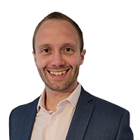 Headshot photograph of Adam Marshall