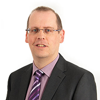 Headshot photograph of Matt Morlock